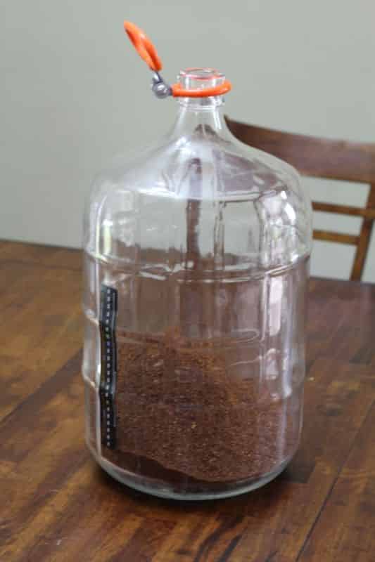 Coffee grounds poured into the carboy #1