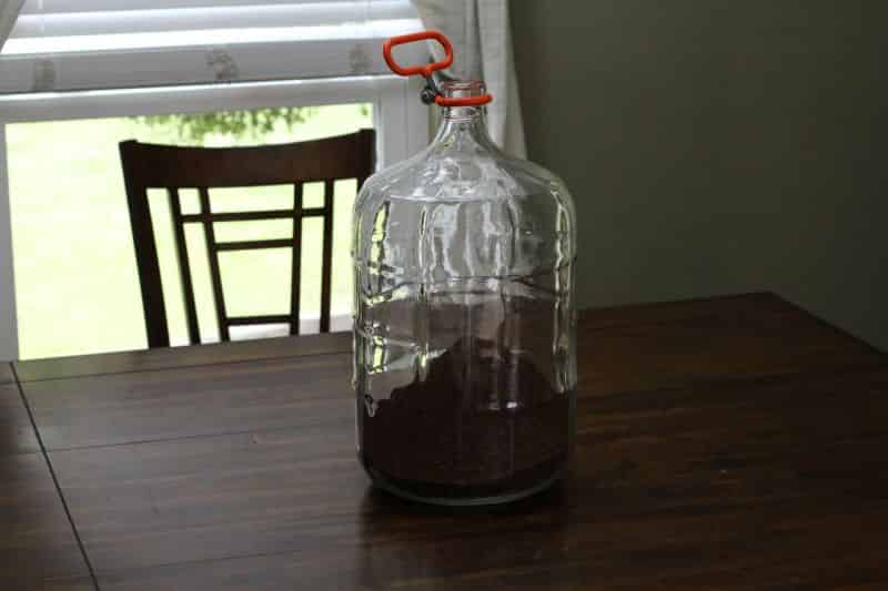 Coffee grounds poured into the carboy #2