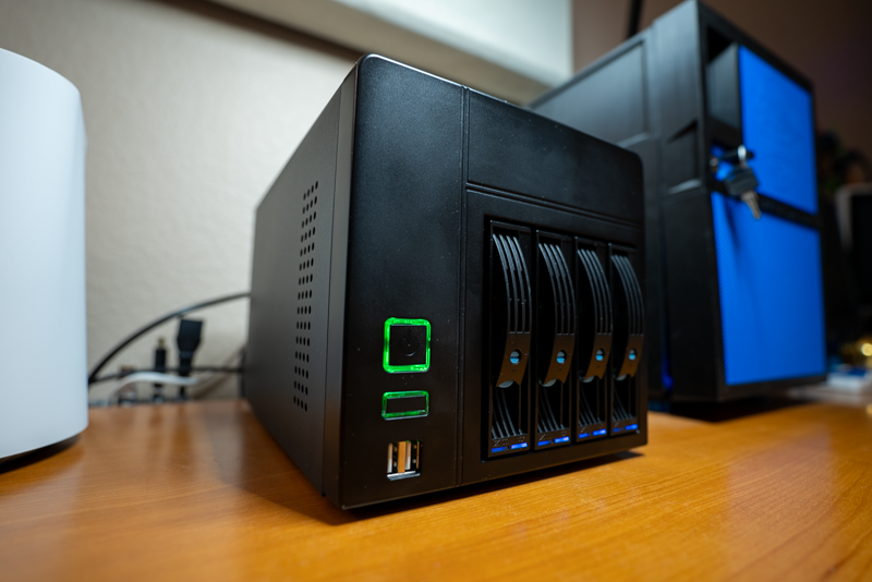 The DIY NAS: EconoNAS 2023 sitting atop a desk next to a Toaster NAS and Brian's DIY NAS