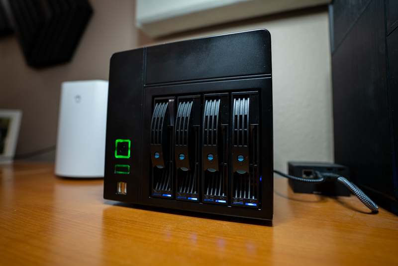 The DIY NAS: EconoNAS 2023 sitting atop a desk next to a Toaster NAS and Brian's DIY NAS