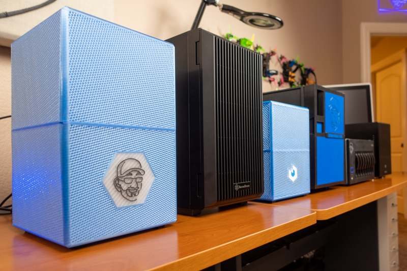 Each of Brian's personal DIY NAS builds lined up next to each other!